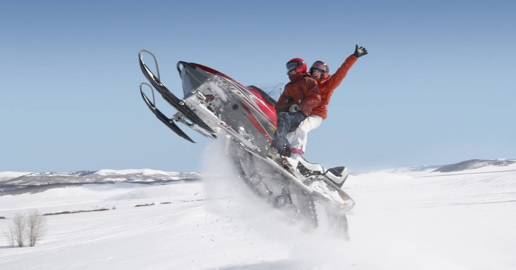 Top Activities in the United States to Do Where You’ll Need a Satellite Phone: Snowmobiling